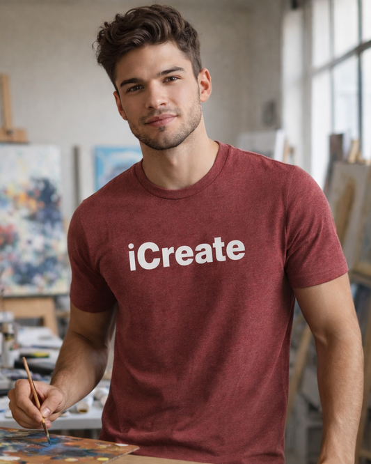 Man wearing a 'iCreate' t-shirt in an art studio.